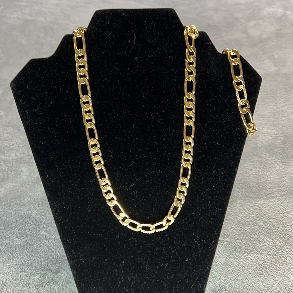 Wonderful world, necklace, and bracelet set by Alexa Rae